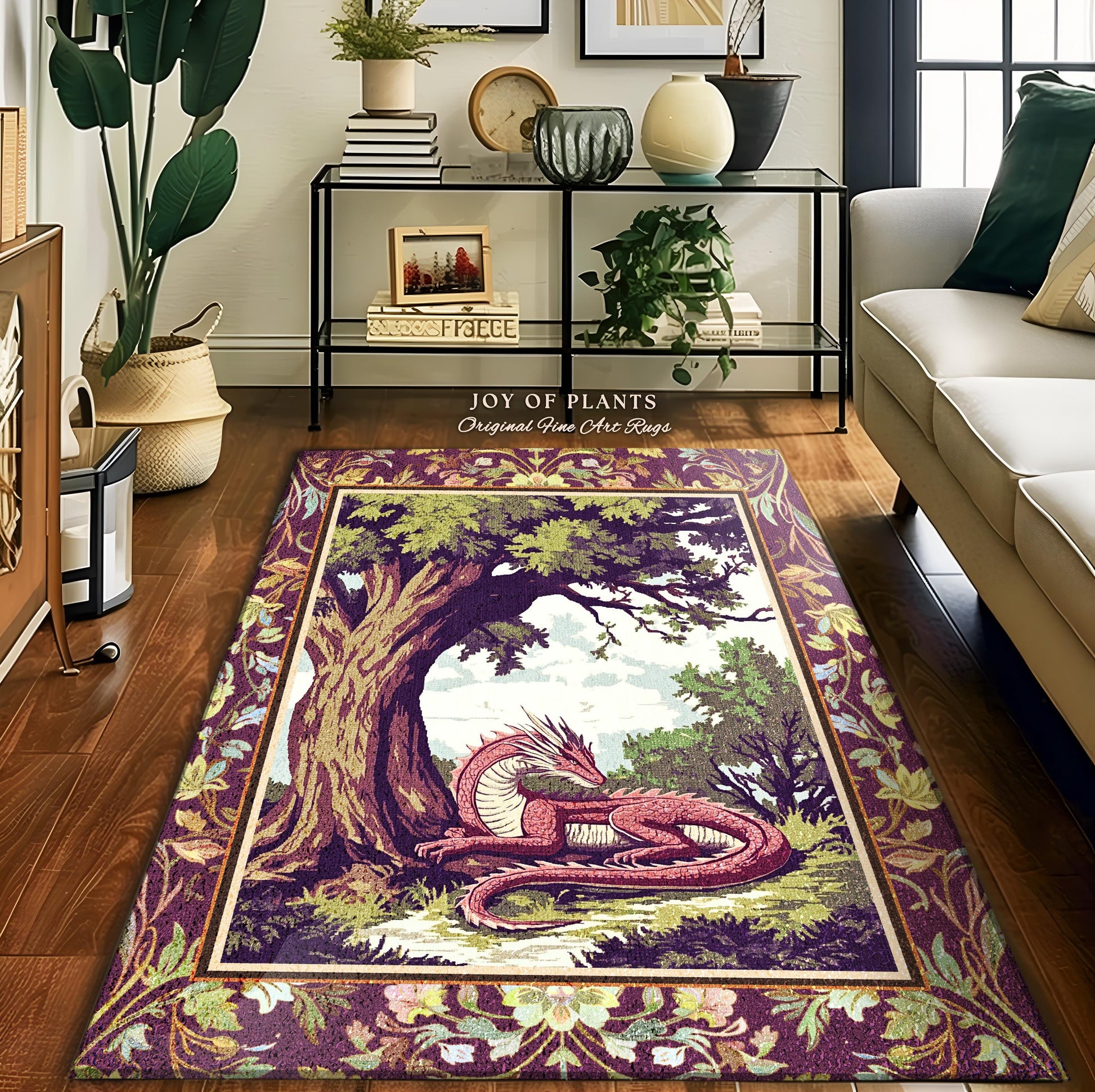 May include: A purple rug with a tapestry design featuring a pink dragon resting under a large tree. The rug has a medieval-style border with floral accents. The text 'JOY OF PLANTS Original Fine Art Rugs' is visible on the rug. The rug's color palette consists of purples, pinks, greens, and creams. The overall style is whimsical and fantasy-themed, suitable for a living room or bedroom.