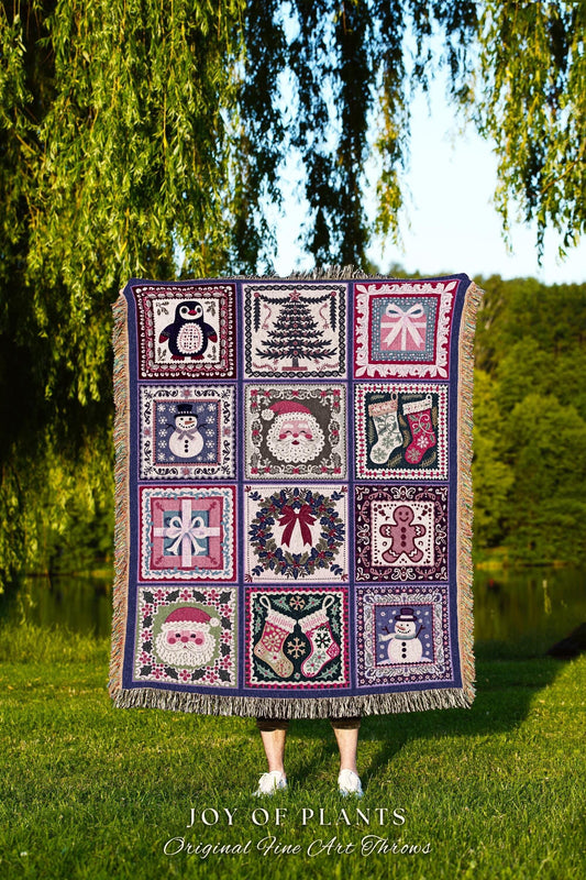 May include: A Christmas-themed woven throw blanket features a patchwork design with various holiday motifs, including Santa Claus, snowmen, penguins, Christmas trees, presents, and stockings. The squares are in shades of purple, pink, green, and cream, creating a festive and cozy feel. The text 'JOY OF PLANTS Original Fine Art Throws' is visible at the bottom.