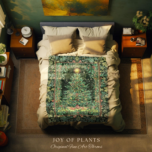May include: A bed with a green Christmas tree throw blanket. The blanket has a detailed design of a Christmas tree with a star on top, surrounded by leaves and berries. The bed has beige pillows and a beige comforter. The room has a green wall and a brown rug. The text 'JOY OF PLANTS Original Fine Art Throws' is at the bottom.