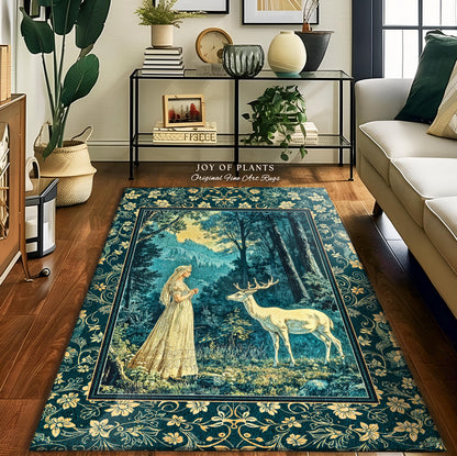 May include: A teal blue rug with a gold border featuring a woman in a white dress standing in a forest with a white deer. The rug has a gold border with floral designs. The text on the rug reads &#39;Joy of Plants Original Fine Art Rugs&#39;.