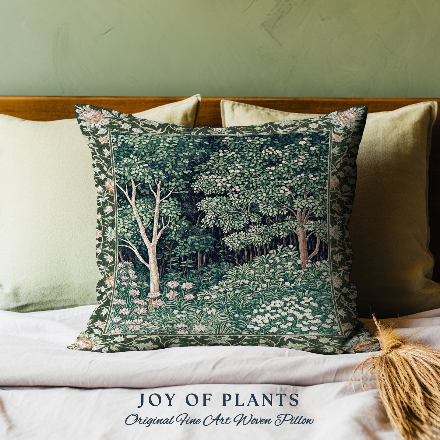 May include: A green and white woven pillow with a forest scene featuring trees and flowers. The pillow has a dark green border and the text "JOY OF PLANTS Original Fine Art Woven Pillow" is printed below the pillow.