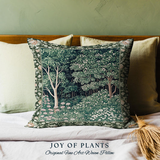 May include: A green and white woven pillow with a forest scene featuring trees and flowers. The pillow has a dark green border and the text "JOY OF PLANTS Original Fine Art Woven Pillow" is printed below the pillow.