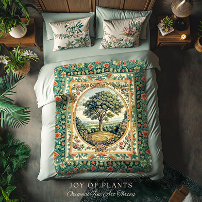 May include: A bed with a green comforter and two floral pillows. A decorative throw blanket with a tree scene is draped over the bed. The throw has a green border with flowers and the text "JOY OF PLANTS Original Fine Art Throws".