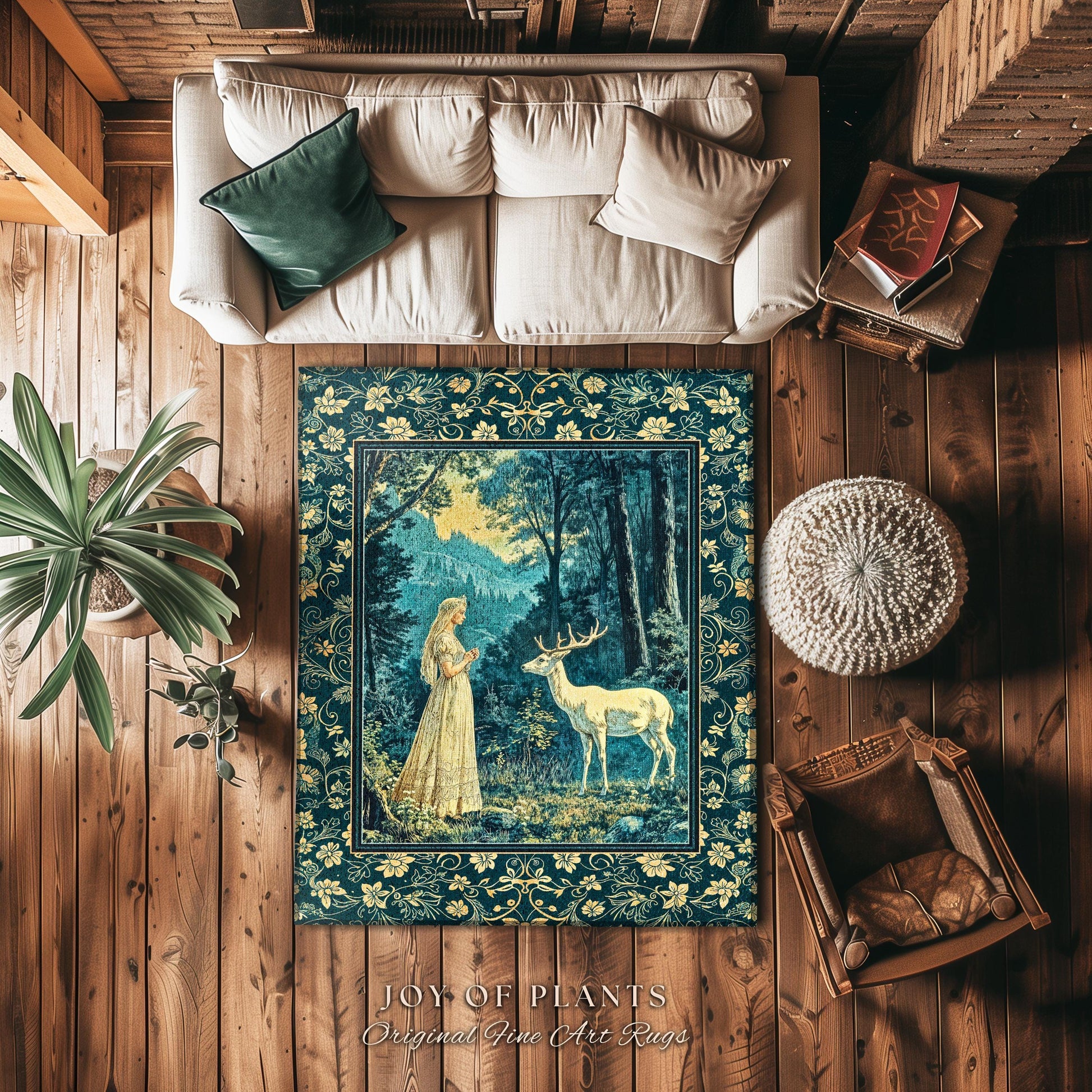 May include: A blue and gold tapestry rug with a forest scene featuring a woman in a white dress and a white deer. The rug has a border of floral designs and the text "JOY OF PLANTS Original Fine Art Rugs".