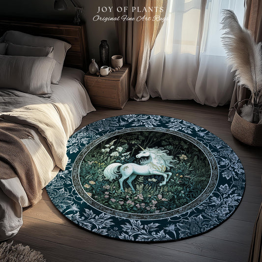 May include: Round rug with a dark teal border featuring a white floral pattern. The center showcases a white unicorn in a forest scene. The rug has the text "JOY OF PLANTS Original Fine Art Rugs".