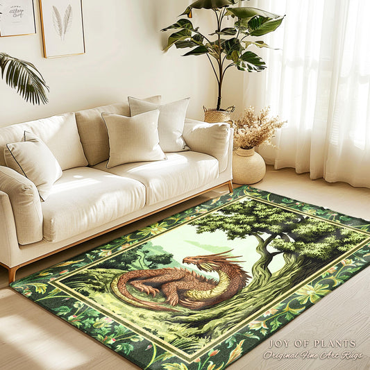 May include: A green and brown area rug with a dragon design. The dragon is curled up in a green forest with a large tree. The rug has a border of green leaves and flowers. The text "JOY OF PLANTS Original Fine Art Rugs" is in the bottom right corner.