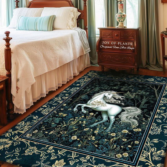May include: A rectangular area rug featuring a white unicorn in a forest scene with a dark blue background. The rug has a floral border and the text "JOY OF PLANTS Original Fine Art Rugs". The rug is placed in a bedroom.