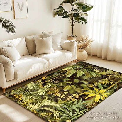 May include: A green and yellow area rug with a botanical print of tropical leaves and flowers. The rug is on a light wood floor in front of a white couch.