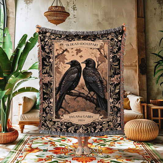 May include: A woven tapestry throw blanket featuring two black ravens perched on a branch. The design includes the text "TIL DEATH DO US PART" and a banner with the names "DYLAN & GABBY" and the year "2024". The blanket has a black border with floral accents.
