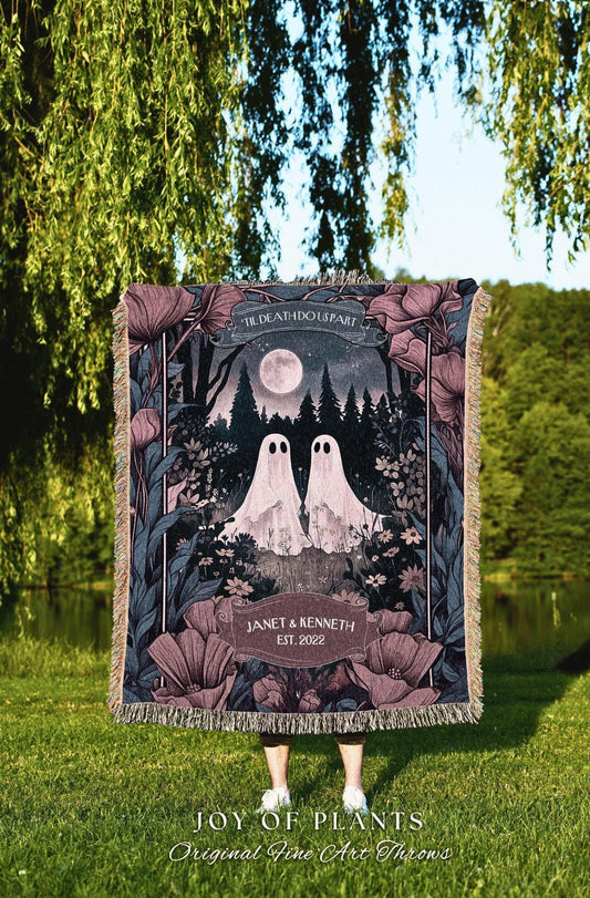 May include: A woven throw blanket featuring a forest scene with two ghost figures under a full moon. The blanket has a floral border and the text "TIL DEATH DO US PART" and "JANET & KENNETH EST. 2022".