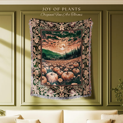 May include: A tapestry throw featuring a landscape with pumpkins, a full moon, and a sunset. The throw has a green border with floral and leaf patterns, and the text "JOY OF PLANTS Original Fine Art Throws" is at the top.