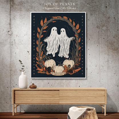 May include: A framed art print featuring two ghost figures with outstretched arms, surrounded by pumpkins and autumn foliage. The text "BEST FRIENDS FOREVER" and "DANNY & JAMIE" are visible. The artwork is set against a dark blue background.
