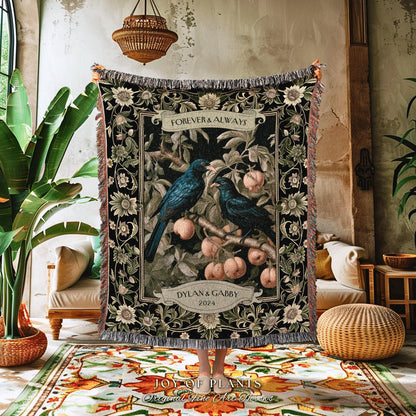 May include: A black woven throw blanket featuring a design with two blue birds perched on a branch with peaches. The words "FOREVER & ALWAYS" and "DYLAN & GABBY 2024" are displayed on the blanket. The blanket has a fringed edge.